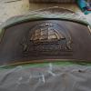 Kongsnaes Potsdam, Logo als Flachrelief